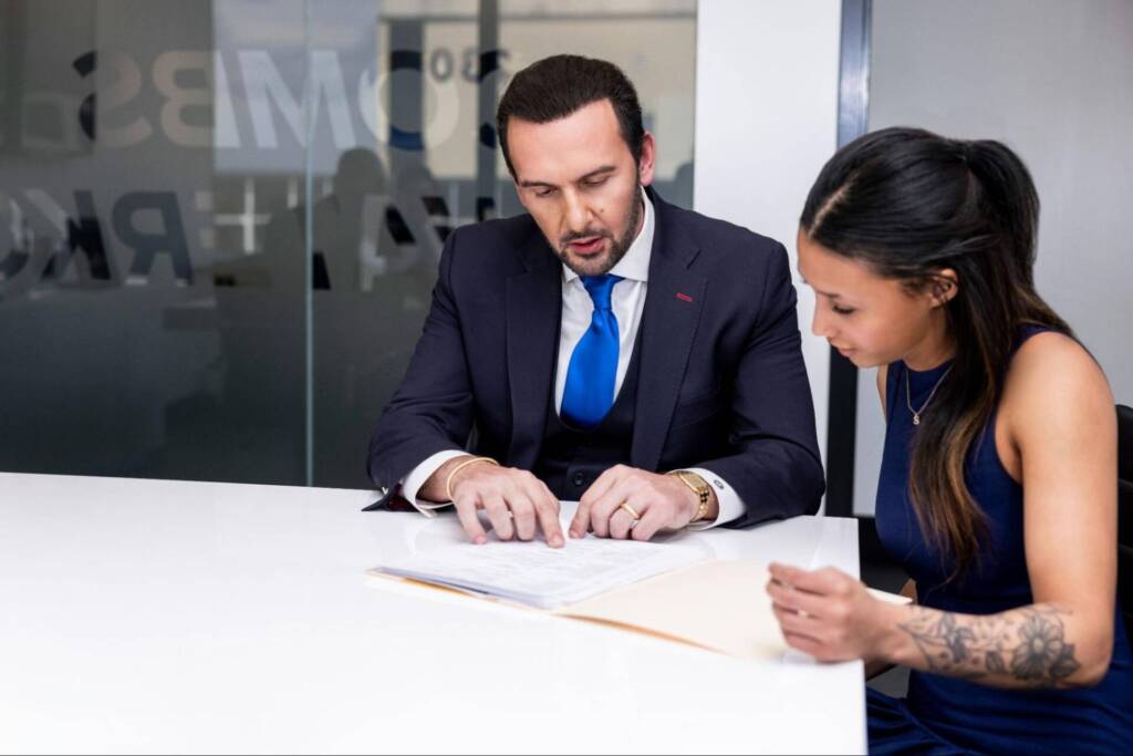 Defense attorney meeting with his client; Client Meeting Attorney
